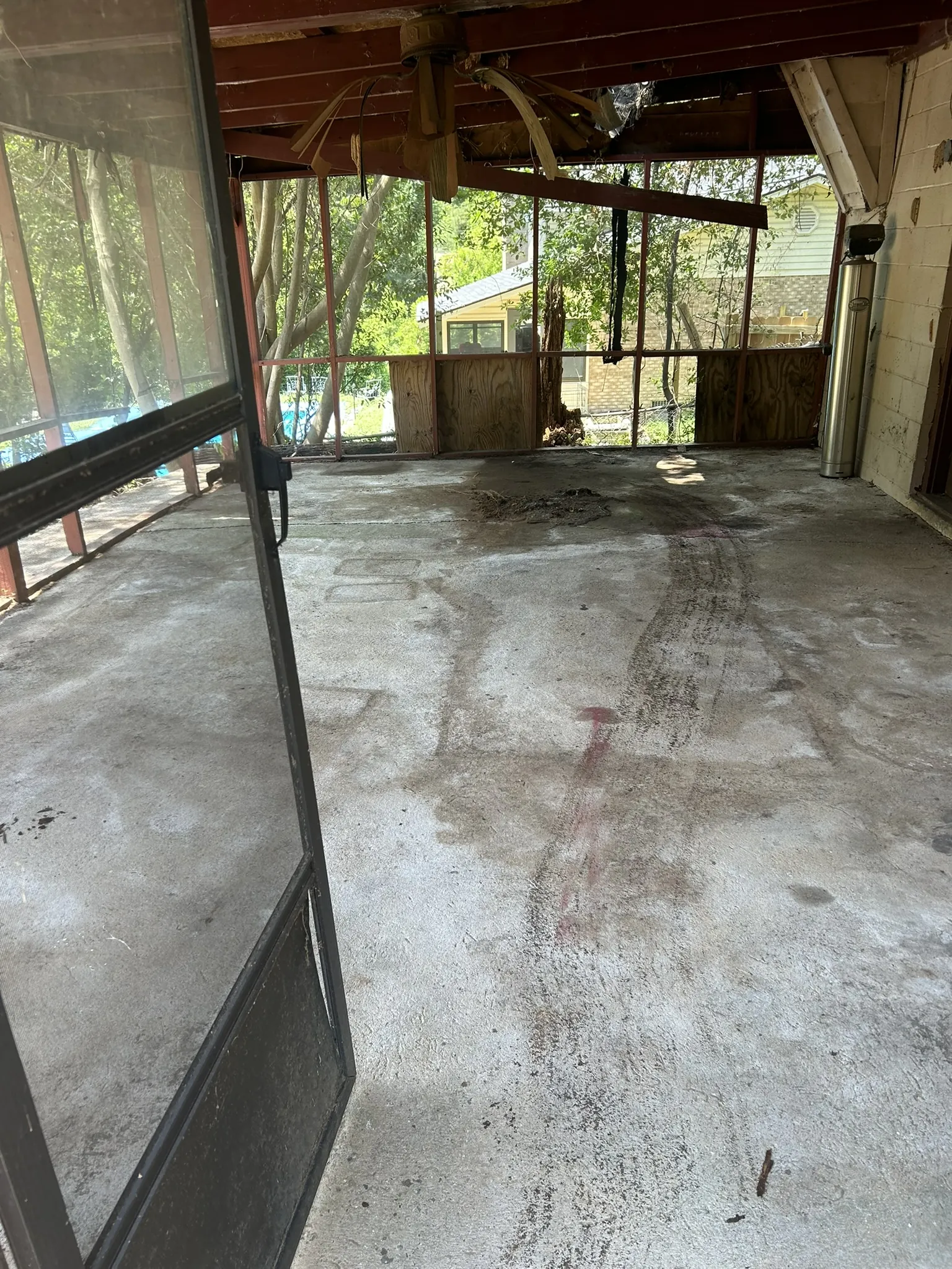 The same covered carport cleared after the pickup