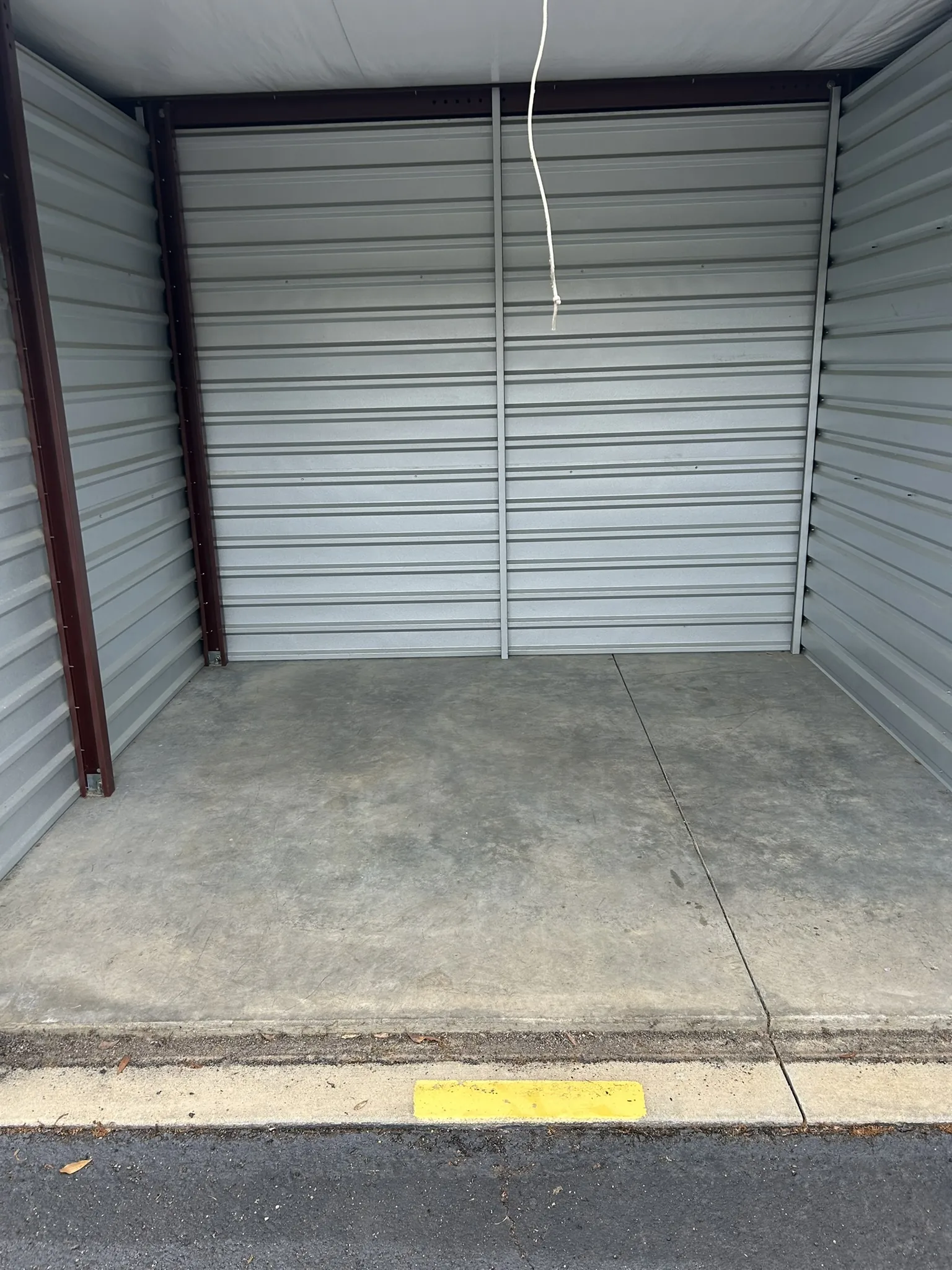 The same storage unit emptied and swept